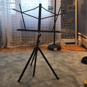 Music sheet stand  can fold up and storage saving